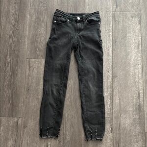 Girls black distressed skinny jeans 8